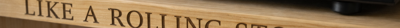 Handcrafted personalised turntable stand engraved with 'Like a Rolling Stone' — a unique Father's Day gift from The Rolling Cow