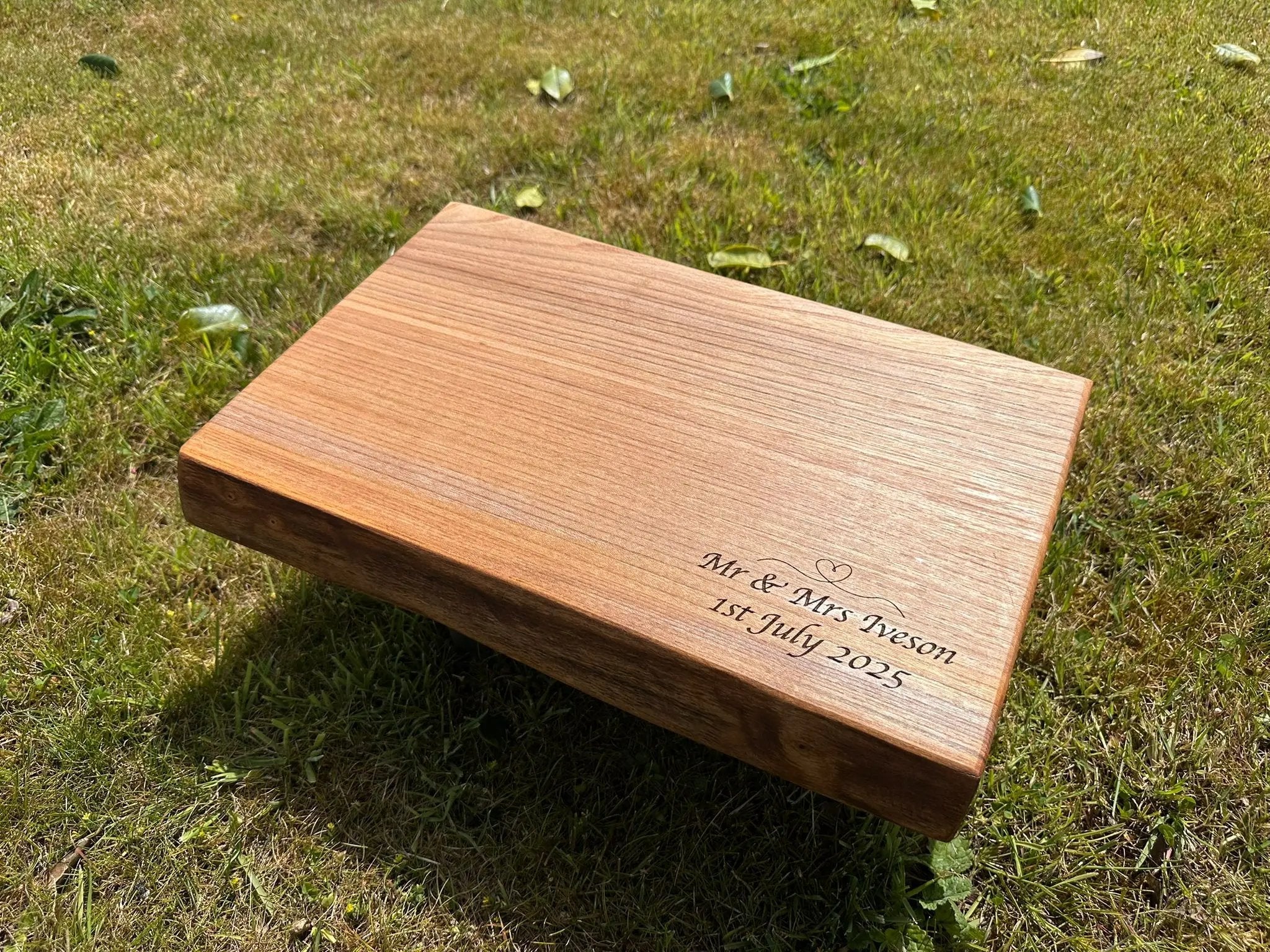 Personalised engraved solid wood live edge chopping board — a unique handcrafted Christmas gift from The Rolling Cow