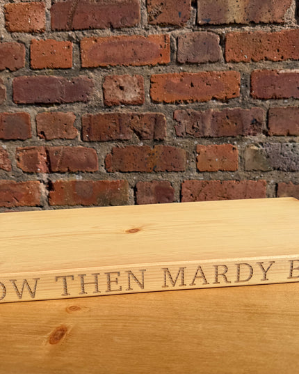 ‘Now then mardy bum’ engraved shelf