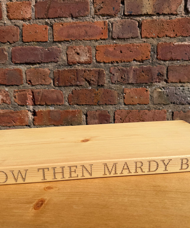 ‘Now then mardy bum’ engraved shelf