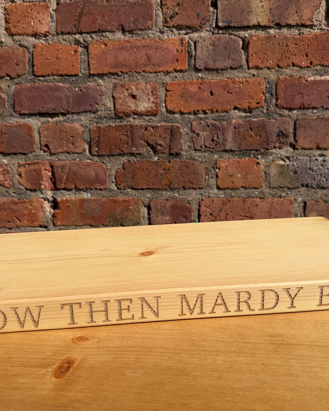‘Now then mardy bum’ engraved shelf
