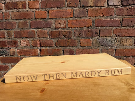 ‘Now then mardy bum’ engraved shelf