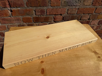 ‘Now then mardy bum’ engraved shelf